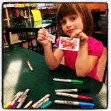 At our library, kids get to decorate their own library card. We told Annika that she could get her own card when she turned 5. This is what we did on the 21st. she didn't waste any time.